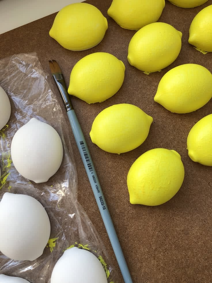 Fresh lemons on Italian branches